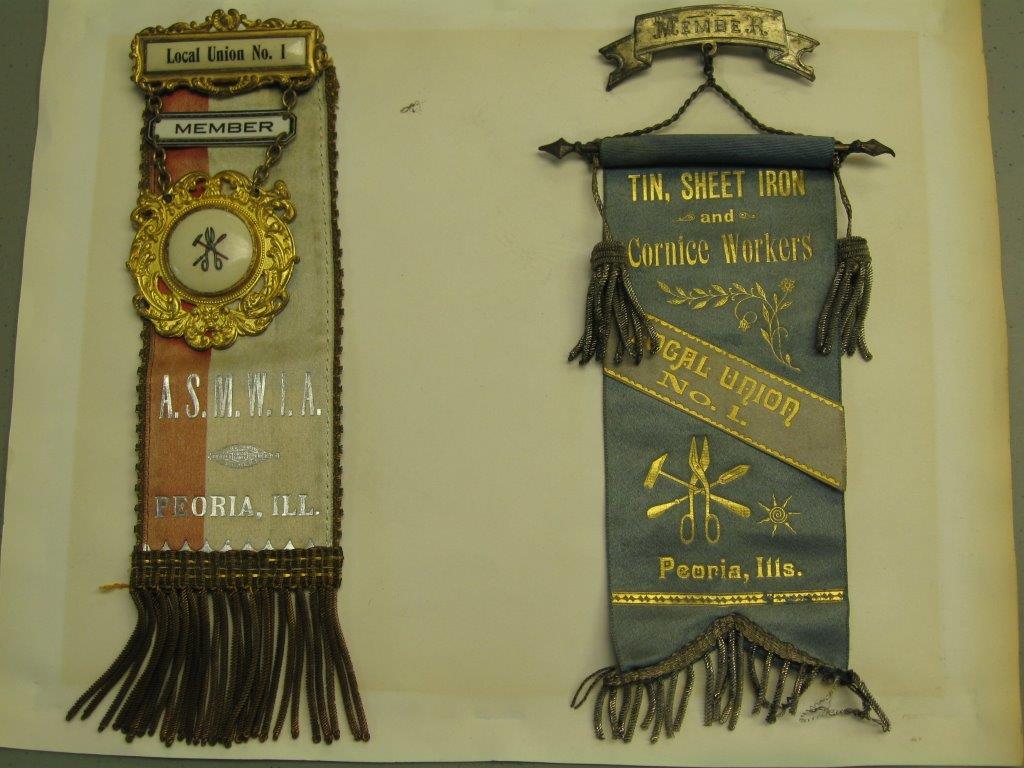 Picture of early Local 1 member badges from late 1800's - early 1900's